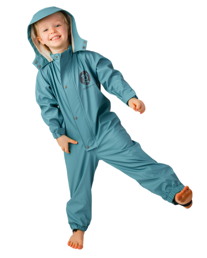 Kid wearing teal, deep sea green blue colour waterproof rain suit, flexible all in one kids rainwear for outdoor play