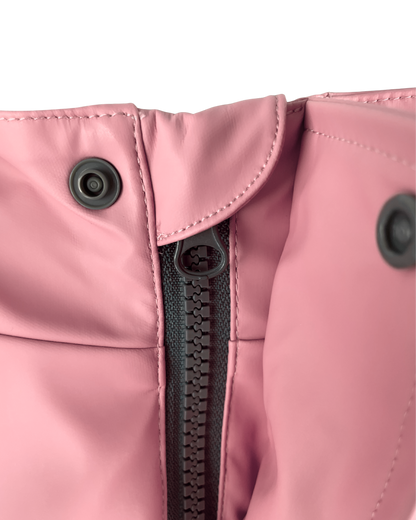 Kids waterproof jacket zip detail with storm flap, durable rain jacket with mud guard