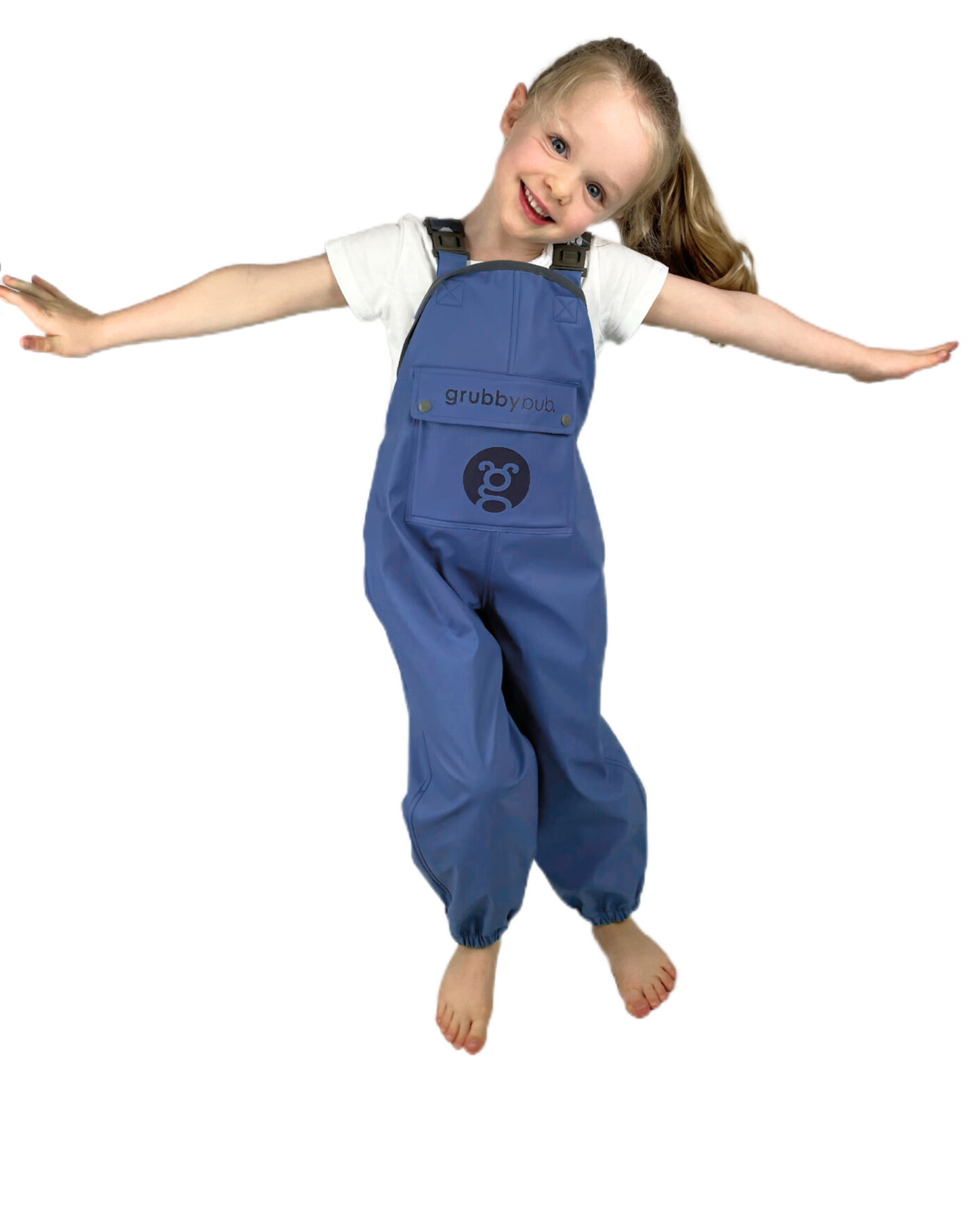 Child wearing sustainable blue waterproof overalls  on a white background