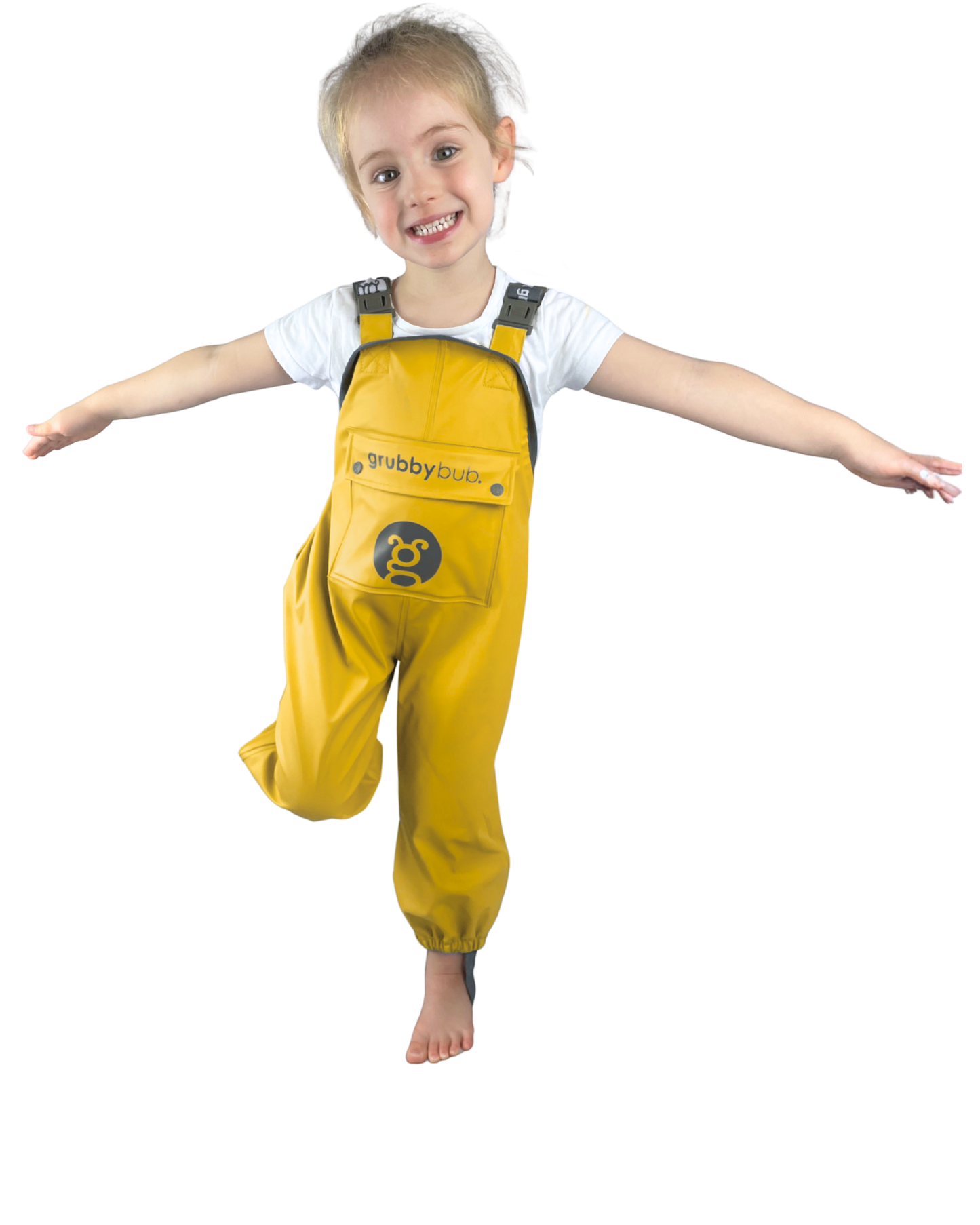 Child wearing yellow waterproof rain pant overalls on a white background