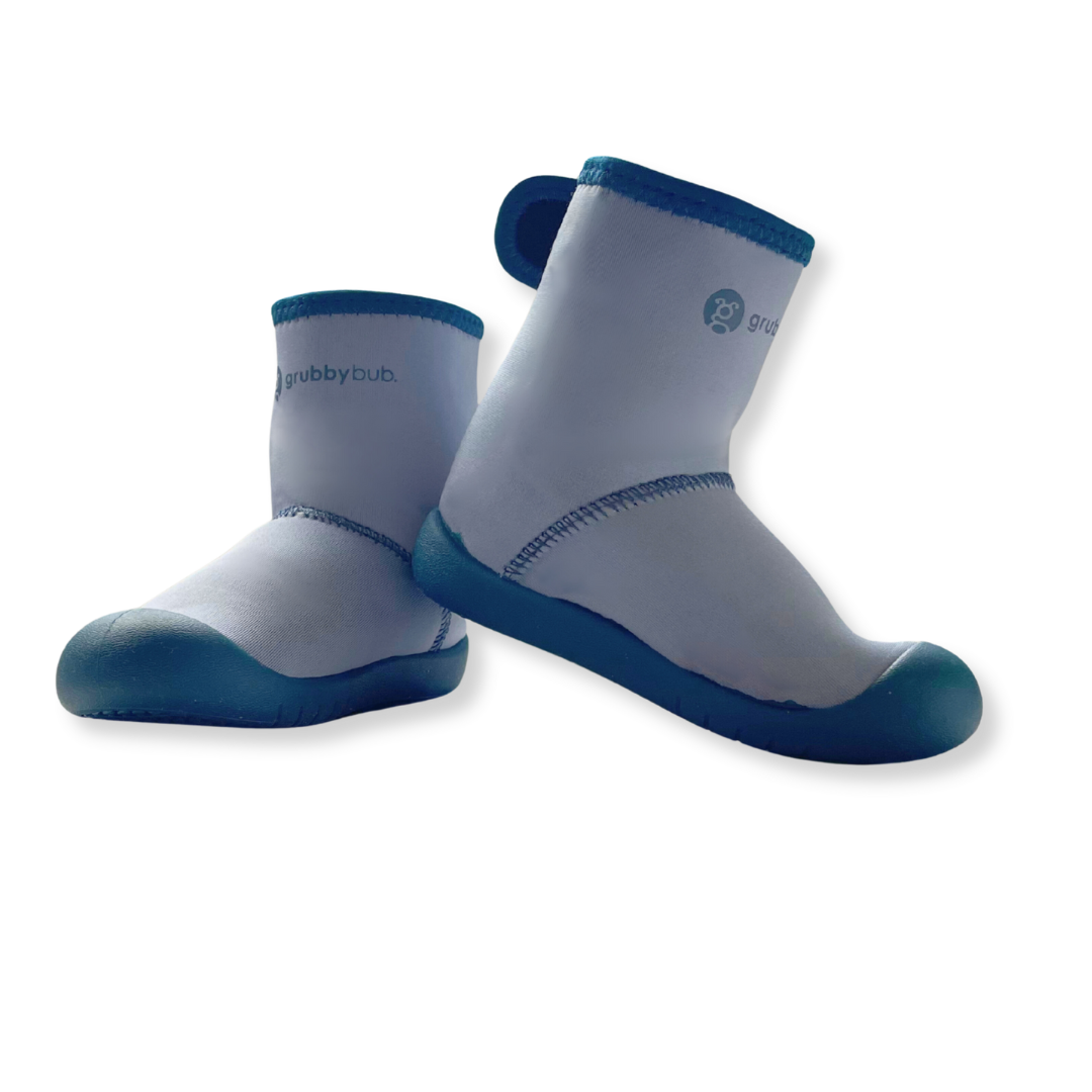 blue lightweight wee wellies for babies and toddlers in product still pose